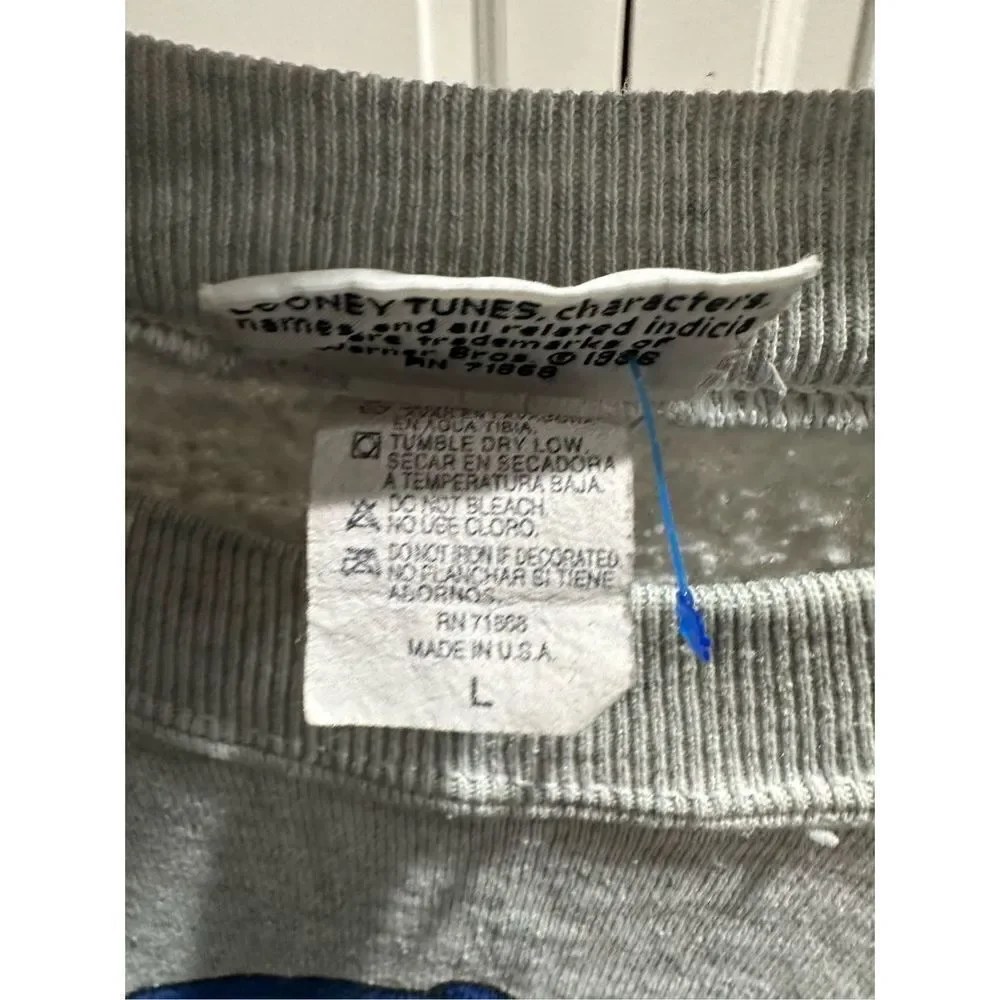 Vintage 1996 Tweety Bird Warner Bros Sweatshirt -Made in the USA. Some stains.